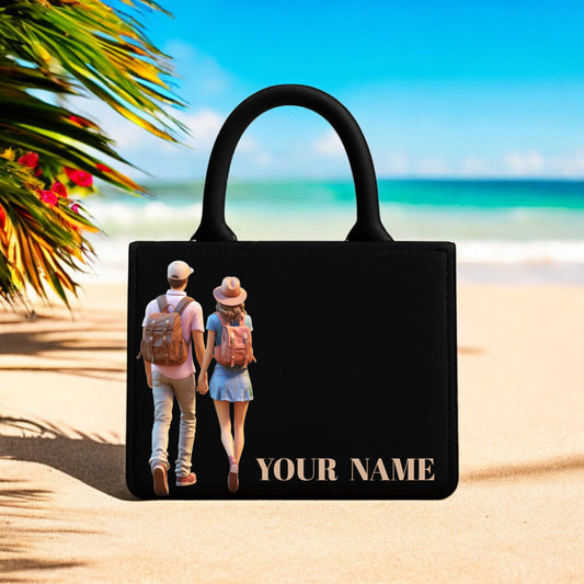 Travel Couple Handbag where style meets sentiment. Crafted with elegance and durability, this 10-inch (height) x 12-inch (width) handbag