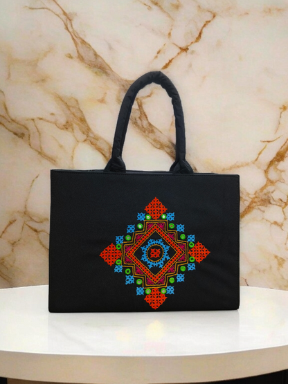 Black Handcrafted Tote Bag Featuring Colorful Geometric Tribal Embroidery