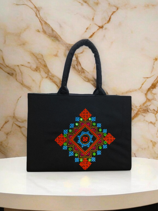 Black Handcrafted Tote Bag Featuring Colorful Geometric Tribal Embroidery